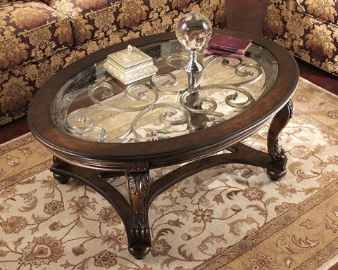 Norcastle Oval Cocktail Table Dark Brown by Ashley Furniture